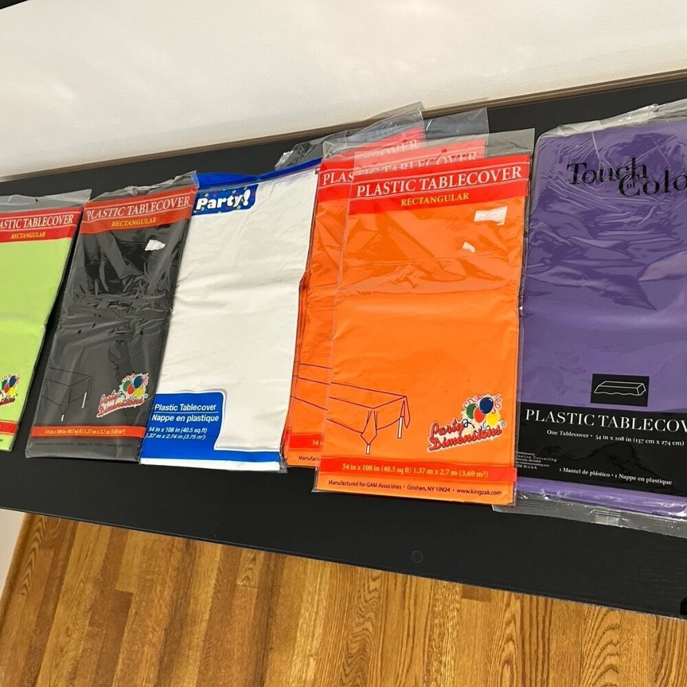 NEW - Lot of 7 Plastic tablecloths, Assorted Colors